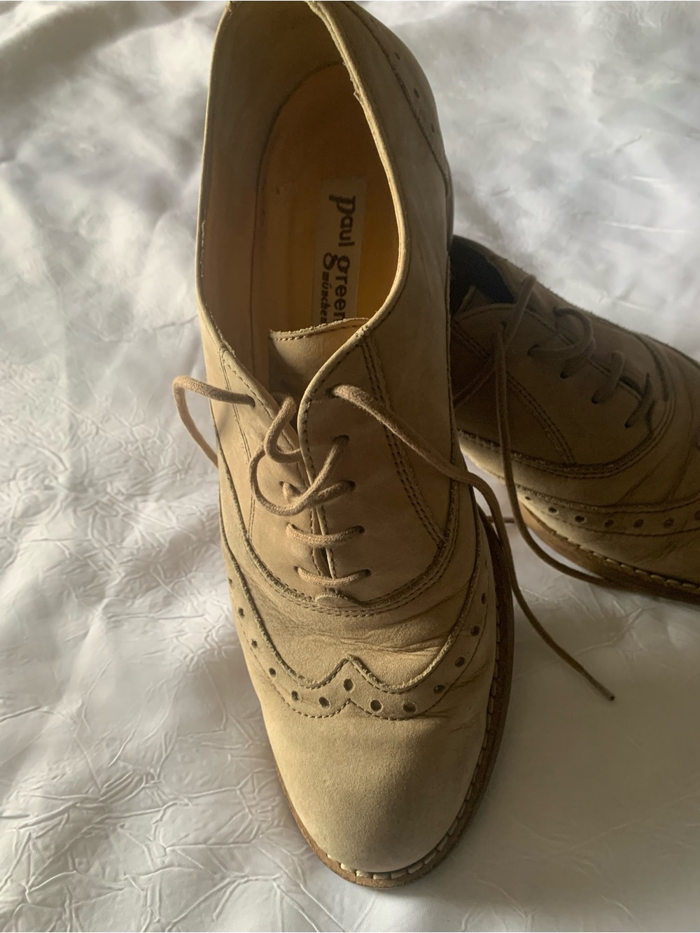 Paul Green beige suede wingtip oxford flats featuring classic brogue perforation